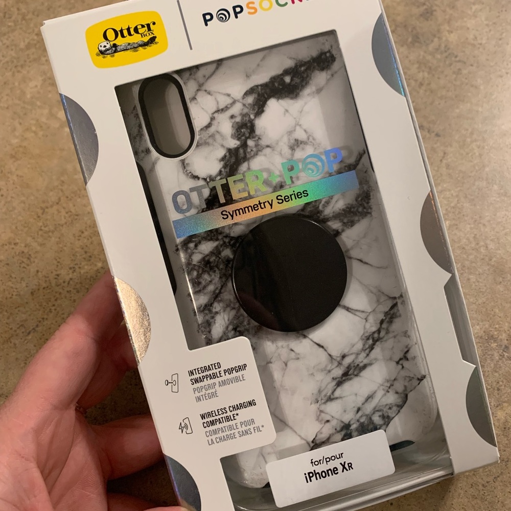IPhone XR otter box + pop symmetry.
